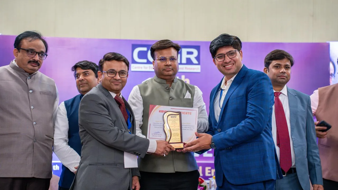 Amit Tiwari and Dr. Nandan Gijare of aFactor receive the Best Training Partner for Curriculum 2026 award from CEGR at Hotel Eros, New Delhi