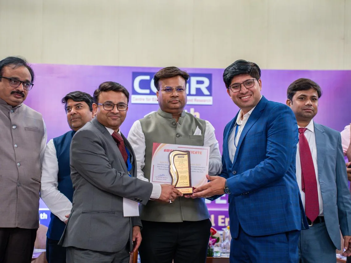 Amit Tiwari and Dr. Nandan Gijare of aFactor receive the Best Training Partner for Curriculum 2026 award from CEGR